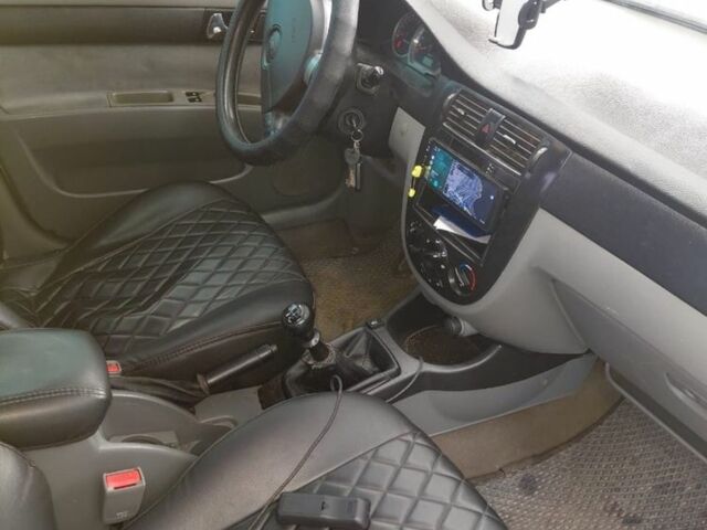 Серый Шевроле Лачетти, объемом двигателя 1.8 л и пробегом 312 тыс. км за 3500 $, фото 1 на Automoto.ua