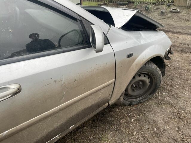 Серый Шевроле Лачетти, объемом двигателя 1.8 л и пробегом 160 тыс. км за 2000 $, фото 5 на Automoto.ua