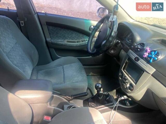 Серый Шевроле Лачетти, объемом двигателя 1.4 л и пробегом 314 тыс. км за 3700 $, фото 17 на Automoto.ua