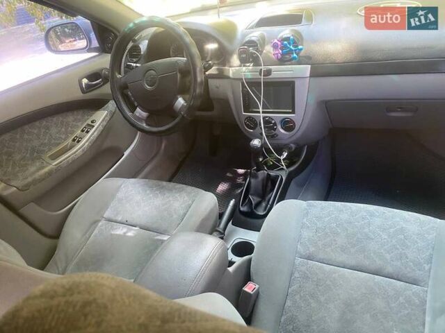 Серый Шевроле Лачетти, объемом двигателя 1.4 л и пробегом 314 тыс. км за 3700 $, фото 5 на Automoto.ua