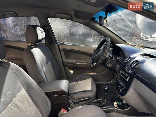 Серый Шевроле Лачетти, объемом двигателя 1.6 л и пробегом 380 тыс. км за 2200 $, фото 3 на Automoto.ua