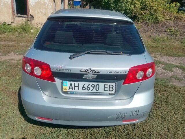 Серый Шевроле Лачетти, объемом двигателя 1 л и пробегом 270 тыс. км за 3000 $, фото 1 на Automoto.ua
