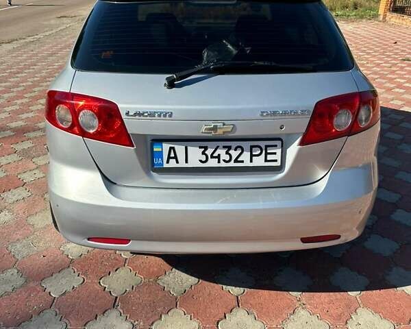 Серый Шевроле Лачетти, объемом двигателя 1.8 л и пробегом 206 тыс. км за 3200 $, фото 2 на Automoto.ua
