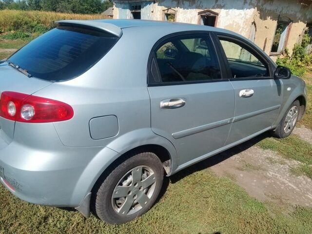 Серый Шевроле Лачетти, объемом двигателя 1 л и пробегом 270 тыс. км за 3000 $, фото 2 на Automoto.ua