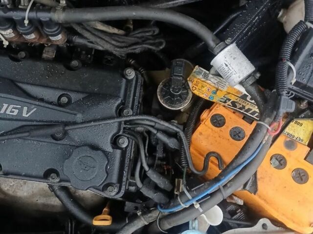 Серый Шевроле Лачетти, объемом двигателя 1.6 л и пробегом 190 тыс. км за 1250 $, фото 12 на Automoto.ua