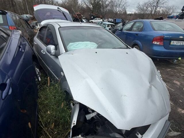 Серый Шевроле Лачетти, объемом двигателя 1.6 л и пробегом 190 тыс. км за 1250 $, фото 3 на Automoto.ua