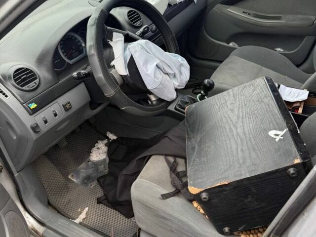 Серый Шевроле Лачетти, объемом двигателя 1.6 л и пробегом 190 тыс. км за 1250 $, фото 4 на Automoto.ua