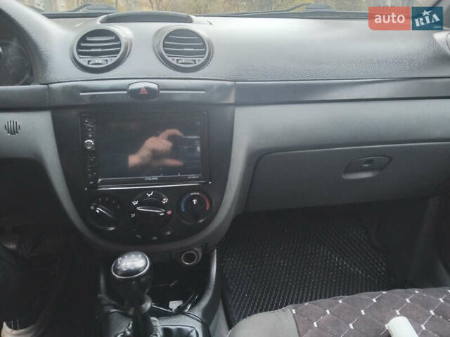 Серый Шевроле Лачетти, объемом двигателя 1.6 л и пробегом 211 тыс. км за 5000 $, фото 6 на Automoto.ua