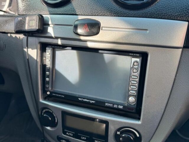 Серый Шевроле Лачетти, объемом двигателя 1.8 л и пробегом 147 тыс. км за 3500 $, фото 3 на Automoto.ua