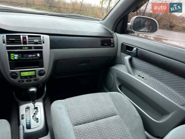 Сірий Шевроле Лачетті, об'ємом двигуна 1.8 л та пробігом 185 тис. км за 4500 $, фото 45 на Automoto.ua