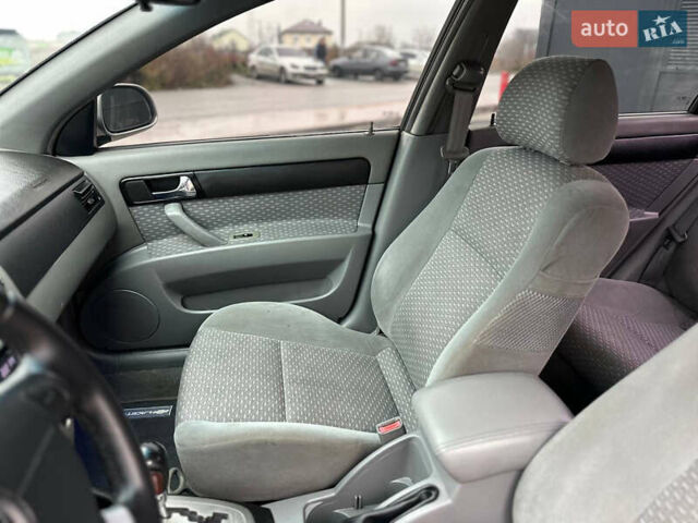 Сірий Шевроле Лачетті, об'ємом двигуна 1.8 л та пробігом 185 тис. км за 4500 $, фото 35 на Automoto.ua
