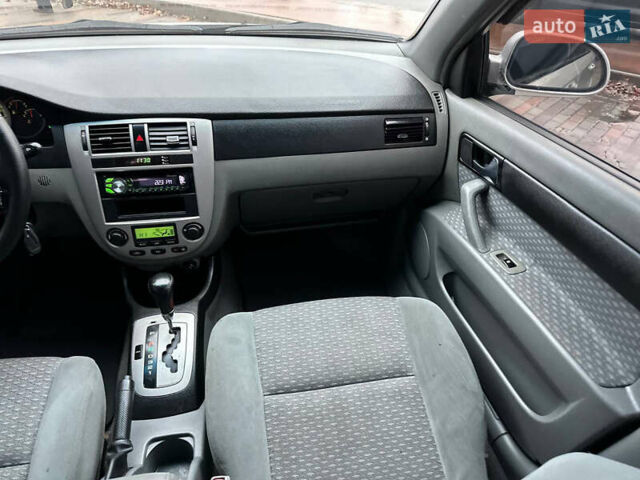 Сірий Шевроле Лачетті, об'ємом двигуна 1.8 л та пробігом 185 тис. км за 4500 $, фото 43 на Automoto.ua
