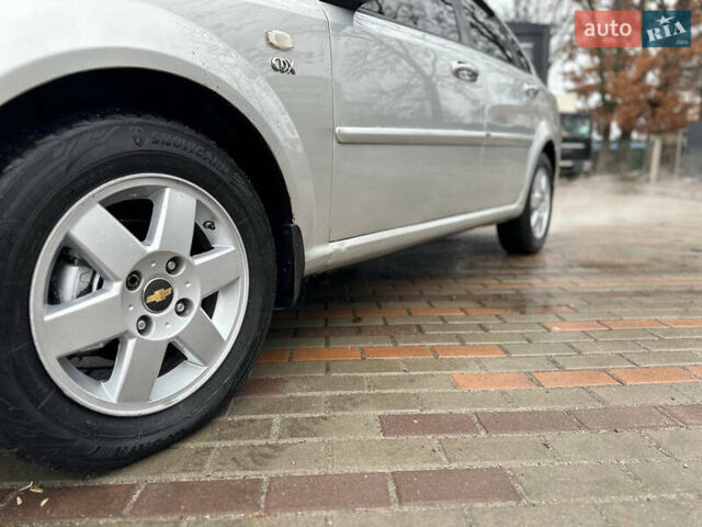 Сірий Шевроле Лачетті, об'ємом двигуна 1.8 л та пробігом 185 тис. км за 4500 $, фото 19 на Automoto.ua
