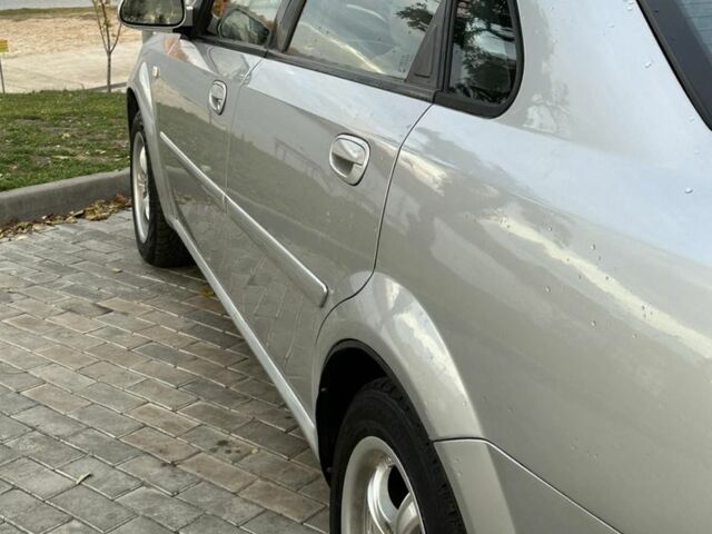 Серый Шевроле Лачетти, объемом двигателя 1.8 л и пробегом 170 тыс. км за 3599 $, фото 16 на Automoto.ua