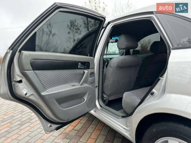 Сірий Шевроле Лачетті, об'ємом двигуна 1.8 л та пробігом 185 тис. км за 4500 $, фото 37 на Automoto.ua