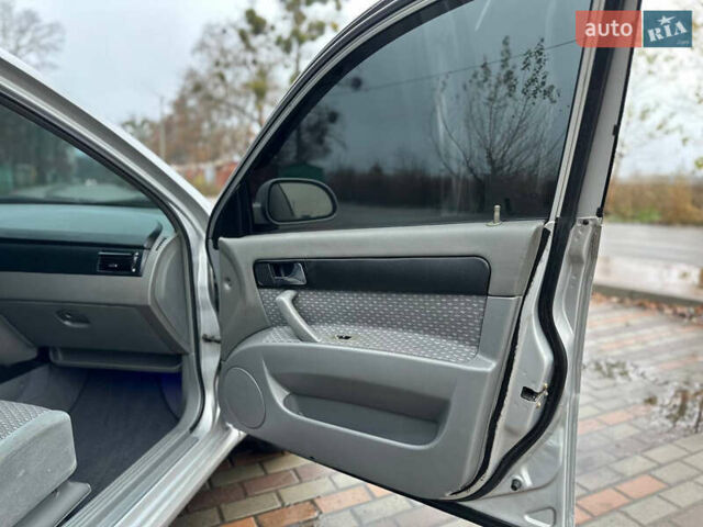Сірий Шевроле Лачетті, об'ємом двигуна 1.8 л та пробігом 185 тис. км за 4500 $, фото 53 на Automoto.ua