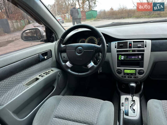 Сірий Шевроле Лачетті, об'ємом двигуна 1.8 л та пробігом 185 тис. км за 4500 $, фото 44 на Automoto.ua