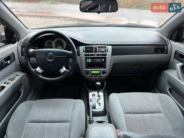 Сірий Шевроле Лачетті, об'ємом двигуна 1.8 л та пробігом 185 тис. км за 4500 $, фото 49 на Automoto.ua