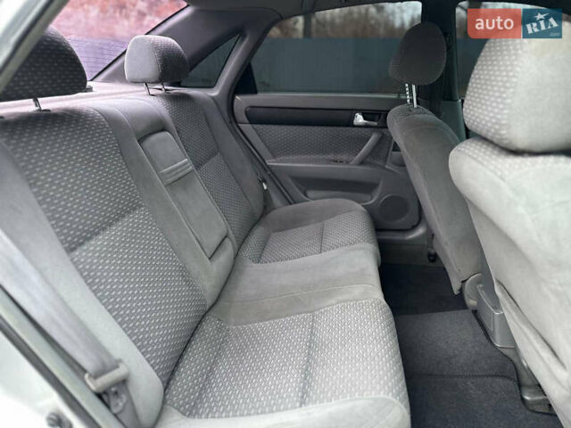 Сірий Шевроле Лачетті, об'ємом двигуна 1.8 л та пробігом 185 тис. км за 4500 $, фото 52 на Automoto.ua