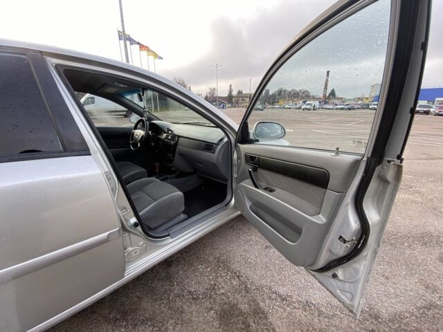 Сірий Шевроле Лачетті, об'ємом двигуна 1.8 л та пробігом 305 тис. км за 2500 $, фото 22 на Automoto.ua