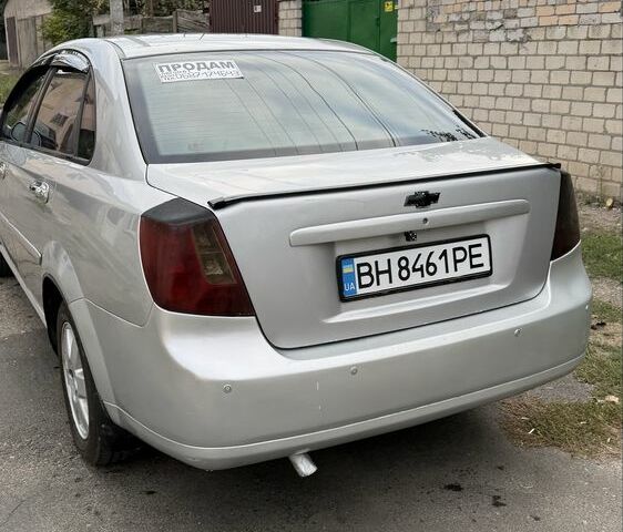 Серый Шевроле Лачетти, объемом двигателя 1.8 л и пробегом 155 тыс. км за 3303 $, фото 4 на Automoto.ua
