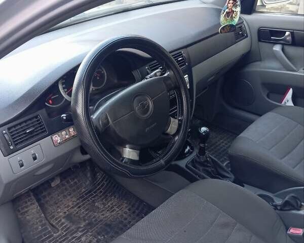 Серый Шевроле Лачетти, объемом двигателя 1.8 л и пробегом 260 тыс. км за 3300 $, фото 7 на Automoto.ua