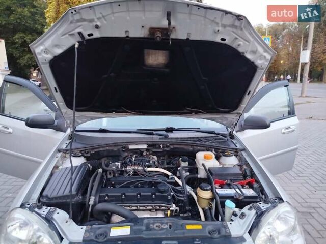 Серый Шевроле Лачетти, объемом двигателя 1.6 л и пробегом 290 тыс. км за 3850 $, фото 23 на Automoto.ua