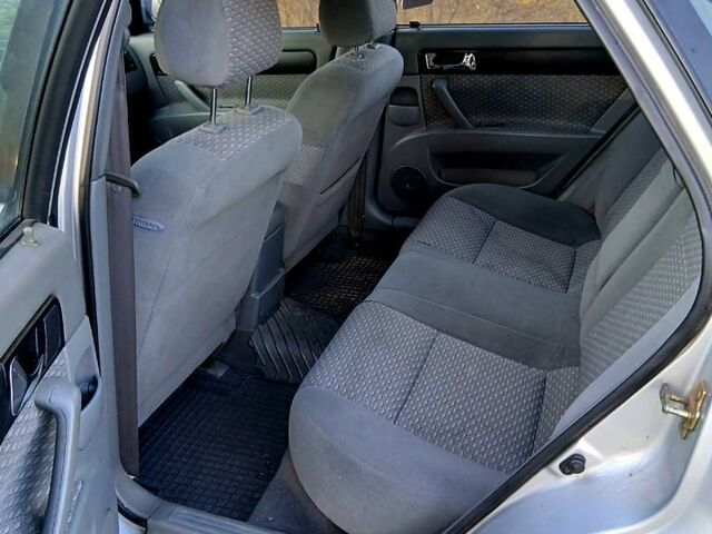 Серый Шевроле Лачетти, объемом двигателя 1.8 л и пробегом 189 тыс. км за 3999 $, фото 6 на Automoto.ua