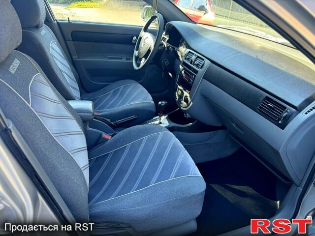 Серый Шевроле Лачетти, объемом двигателя 1.8 л и пробегом 263 тыс. км за 3850 $, фото 1 на Automoto.ua