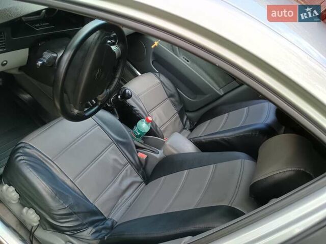 Серый Шевроле Лачетти, объемом двигателя 1.6 л и пробегом 238 тыс. км за 3850 $, фото 26 на Automoto.ua