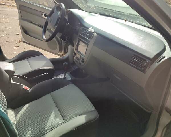 Серый Шевроле Лачетти, объемом двигателя 1.8 л и пробегом 360 тыс. км за 3700 $, фото 1 на Automoto.ua