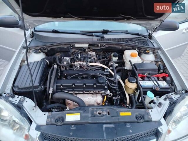 Серый Шевроле Лачетти, объемом двигателя 1.6 л и пробегом 290 тыс. км за 3850 $, фото 21 на Automoto.ua