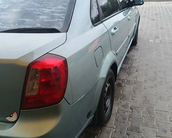 Серый Шевроле Лачетти, объемом двигателя 1.6 л и пробегом 289 тыс. км за 3400 $, фото 2 на Automoto.ua