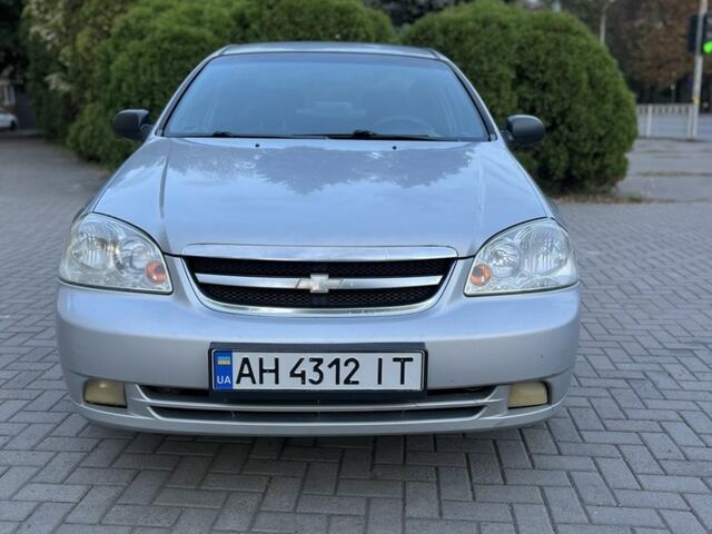 Серый Шевроле Лачетти, объемом двигателя 1.6 л и пробегом 290 тыс. км за 3850 $, фото 2 на Automoto.ua