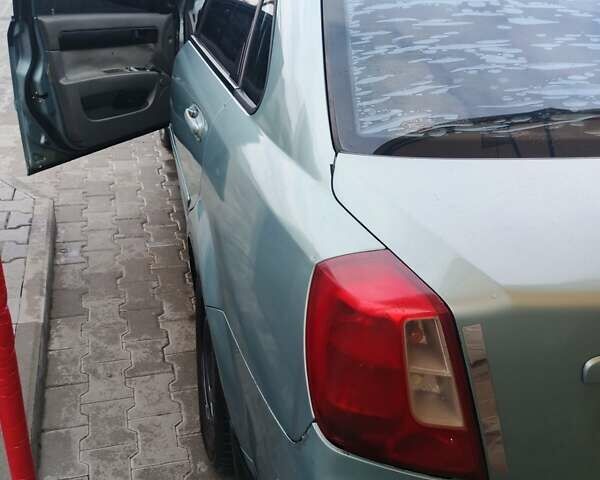 Серый Шевроле Лачетти, объемом двигателя 1.6 л и пробегом 289 тыс. км за 3400 $, фото 1 на Automoto.ua