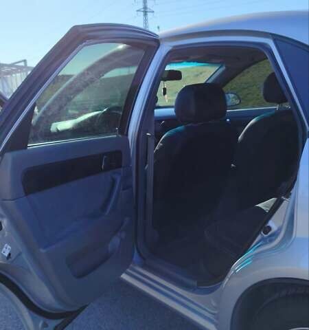 Сірий Шевроле Лачетті, об'ємом двигуна 1.8 л та пробігом 220 тис. км за 5600 $, фото 13 на Automoto.ua