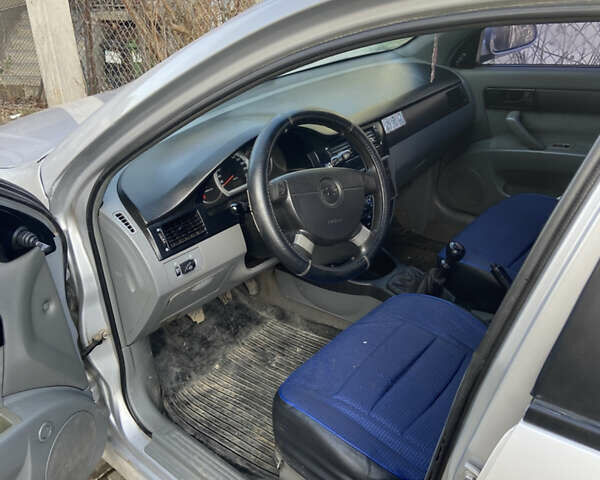 Серый Шевроле Лачетти, объемом двигателя 1.6 л и пробегом 243 тыс. км за 2200 $, фото 6 на Automoto.ua