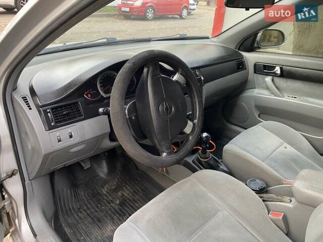 Серый Шевроле Лачетти, объемом двигателя 1.8 л и пробегом 224 тыс. км за 3200 $, фото 11 на Automoto.ua