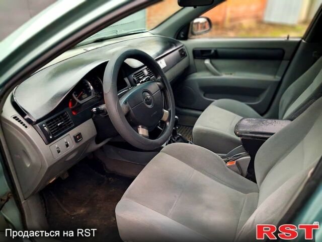 Серый Шевроле Лачетти, объемом двигателя 1.6 л и пробегом 280 тыс. км за 2600 $, фото 4 на Automoto.ua