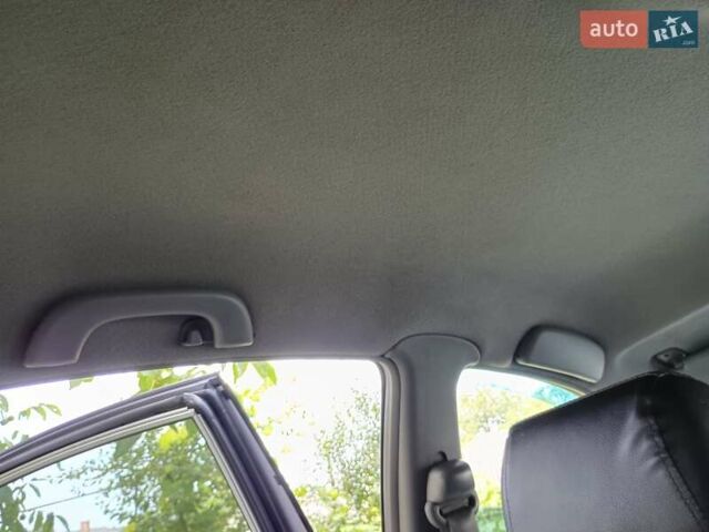 Серый Шевроле Лачетти, объемом двигателя 1.6 л и пробегом 238 тыс. км за 3850 $, фото 14 на Automoto.ua