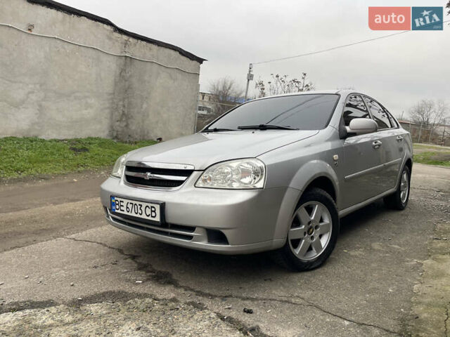 Серый Шевроле Лачетти, объемом двигателя 1.8 л и пробегом 294 тыс. км за 3900 $, фото 1 на Automoto.ua