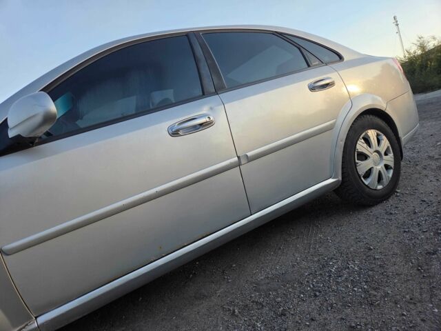 Серый Шевроле Лачетти, объемом двигателя 1.8 л и пробегом 240 тыс. км за 3650 $, фото 4 на Automoto.ua