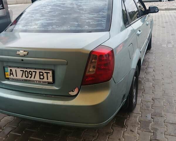 Серый Шевроле Лачетти, объемом двигателя 1.6 л и пробегом 289 тыс. км за 3400 $, фото 3 на Automoto.ua