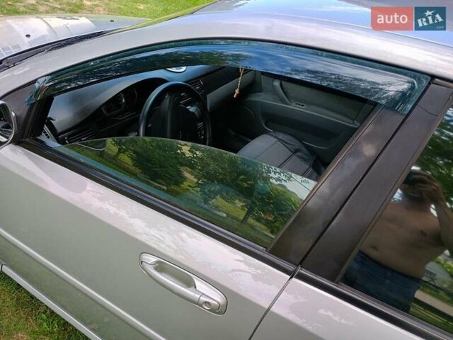 Сірий Шевроле Лачетті, об'ємом двигуна 1.6 л та пробігом 238 тис. км за 3999 $, фото 44 на Automoto.ua