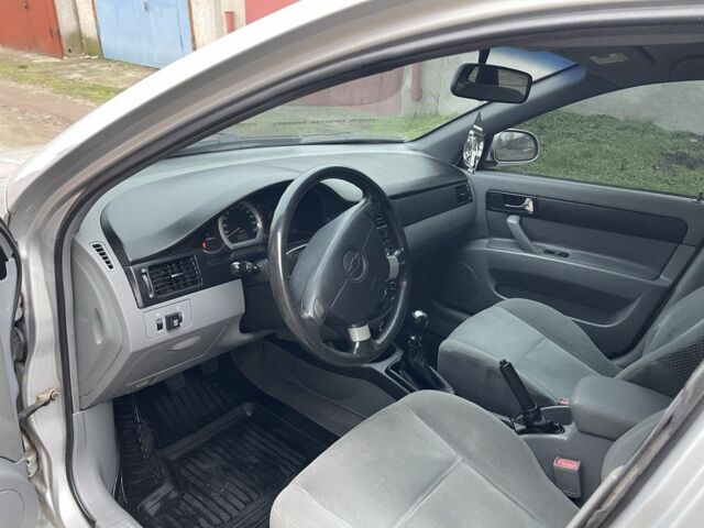 Серый Шевроле Лачетти, объемом двигателя 1.8 л и пробегом 294 тыс. км за 3900 $, фото 12 на Automoto.ua