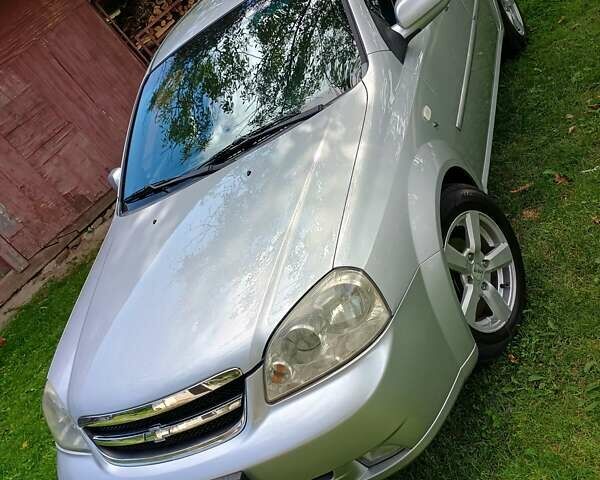 Серый Шевроле Лачетти, объемом двигателя 1.6 л и пробегом 238 тыс. км за 3850 $, фото 44 на Automoto.ua