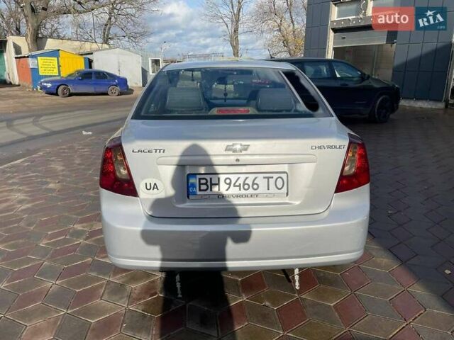 Серый Шевроле Лачетти, объемом двигателя 1.8 л и пробегом 225 тыс. км за 4400 $, фото 2 на Automoto.ua