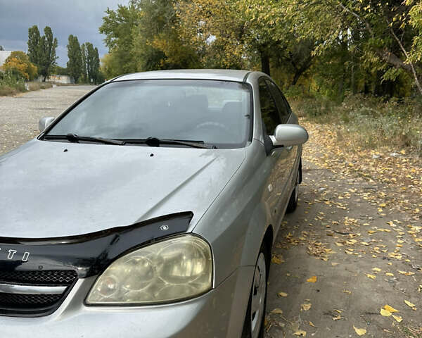 Серый Шевроле Лачетти, объемом двигателя 1.6 л и пробегом 255 тыс. км за 3600 $, фото 1 на Automoto.ua