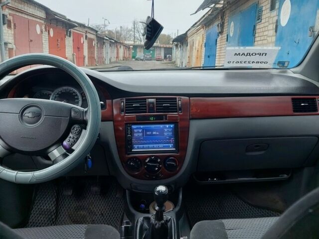 Серый Шевроле Лачетти, объемом двигателя 1.8 л и пробегом 318 тыс. км за 4400 $, фото 4 на Automoto.ua