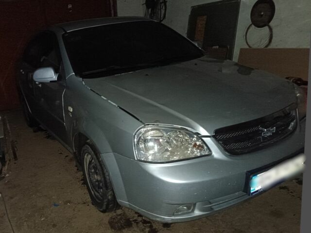 Серый Шевроле Лачетти, объемом двигателя 2 л и пробегом 276 тыс. км за 2400 $, фото 1 на Automoto.ua